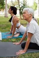 3 Unexpected Ways To Reduce Fall Risk And Maintain Independence. 3 friends doing yoga together park 23 2149891880